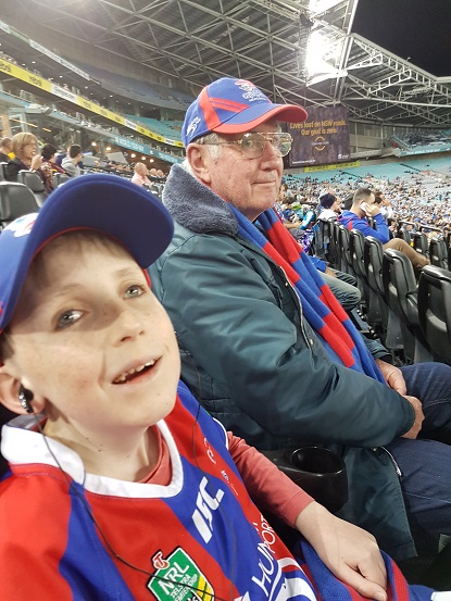 Image shows Mark at a Newcastle Knights game